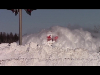 the locomotive makes its way through a meter of snow