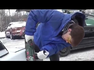 a man took a corner of a zhiguli car to park